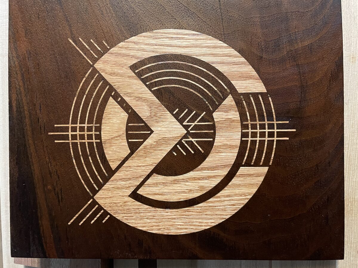 CNC walnut and oak inlay logo